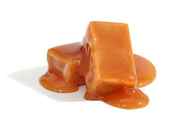 Image showing caramel candies on white background