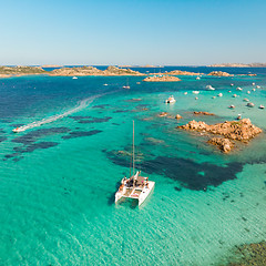 Image showing Drone aerial view of catamaran sailing boat in Maddalena Archipelago, Sardinia, Italy.