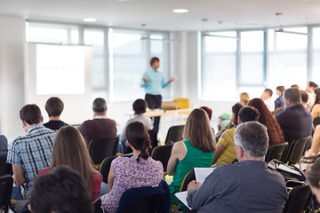 Image showing Speaker giving presentation on business conference.