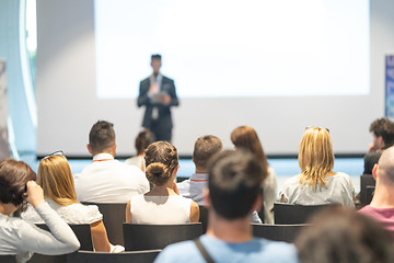 Image showing Male business speaker giving a talk at business conference event.