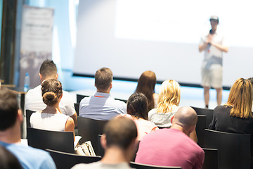 Image showing Male business speaker giving a talk at business conference event.