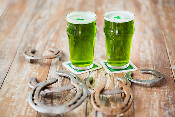 Image showing glasses of green beer with shamrock