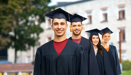 Image showing graduates in mortar boards and bachelor gowns