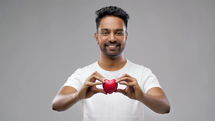 Image showing indian man with red heart over grey background