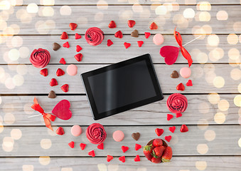 Image showing tablet pc and sweets on valentines day