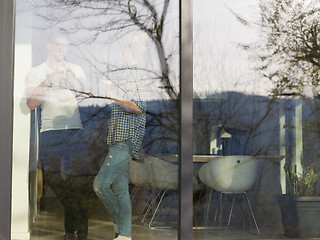 Image showing young couple enjoying morning coffee