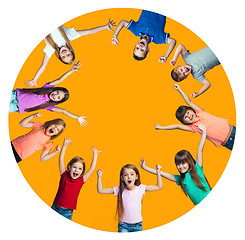 Image showing Happy success teensl celebrating being a winner. Dynamic energetic image of happy children