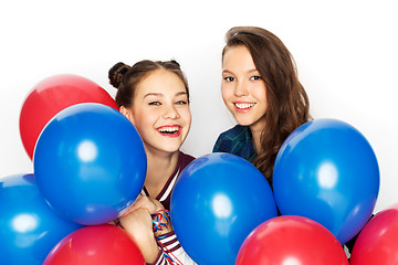 Image showing happy teenage girls with helium balloons