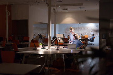 Image showing young designers in the night office