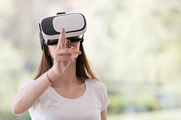 Image showing woman using VR-headset glasses of virtual reality