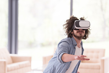 Image showing man using VR-headset glasses of virtual reality