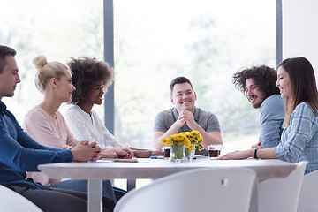 Image showing Multiethnic startup Business Team At A Meeting at modern office 