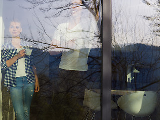 Image showing young couple enjoying morning coffee