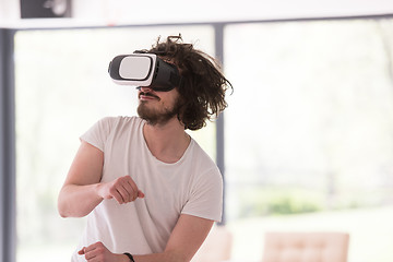 Image showing man using VR-headset glasses of virtual reality