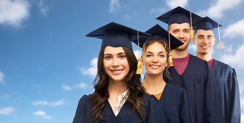 Image showing graduates in mortar boards and bachelor gowns