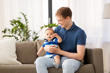 Image showing happy father with baby son at home