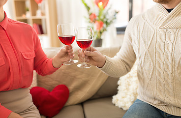 Image showing happy couple drinking red wine on valentines day