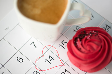 Image showing close up of calendar, coffee, cupcake and heart