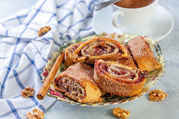 Image showing Rolls with jam, walnuts and raisins. Jewish cuisine.