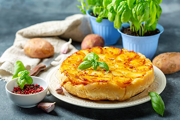 Image showing Homemade Tarte Tatin with potatoes.