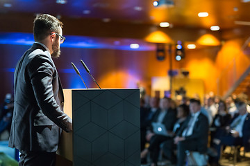 Image showing Public speaker giving talk at business event.