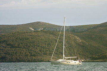 Image showing Sailing boat returns to the harbor