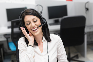 Image showing female call centre operator doing her job