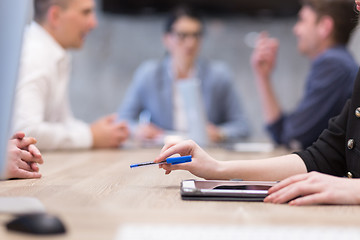 Image showing businesswoman hand using pen