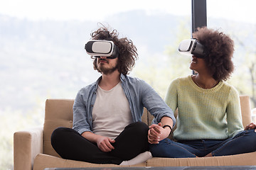 Image showing Multiethnic Couple using virtual reality headset