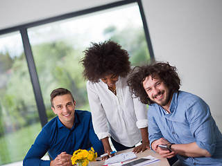 Image showing Multiethnic startup Business Team At A Meeting at modern office 