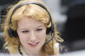 Image showing female call centre operator doing her job