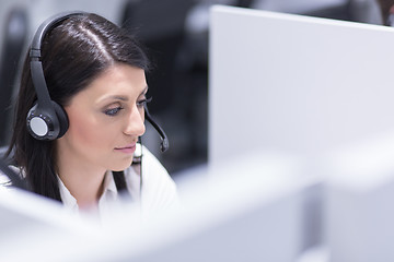 Image showing female call centre operator doing her job