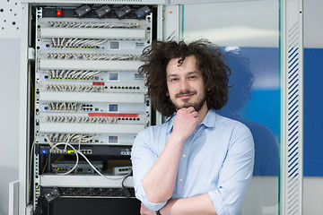 Image showing business man engeneer in datacenter server room