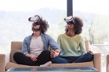 Image showing Multiethnic Couple using virtual reality headset