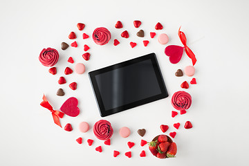 Image showing tablet pc and sweets on valentines day