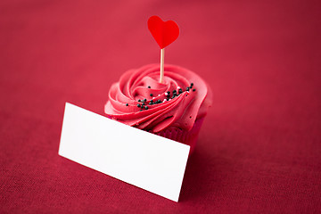 Image showing cupcake with heart cocktail stick and nametag