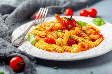 Image showing Tomato pasta fusilli with prawns.