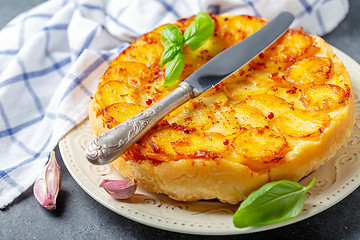 Image showing Pie Tarte Tatin with potatoes close up.