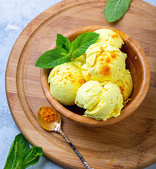 Image showing Golden ice cream with turmeric closeup.