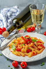 Image showing Fusilli pasta with shrimp in tomato sauce.