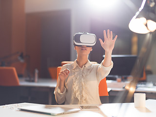 Image showing businesswoman using VR-headset glasses of virtual reality