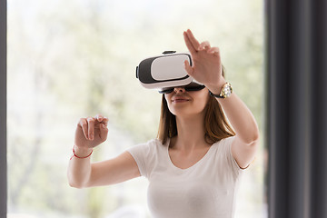 Image showing woman using VR-headset glasses of virtual reality