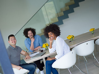 Image showing Multiethnic startup Business Team At A Meeting at modern office 