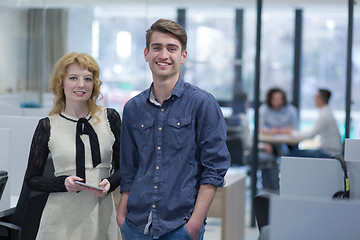 Image showing Business People Working With Tablet in startup office