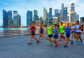 Image showing Running group of people. Singapore