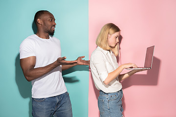 Image showing Businesswoman hugging laptop. Love to computer concept. Attractive female half-length front portrait