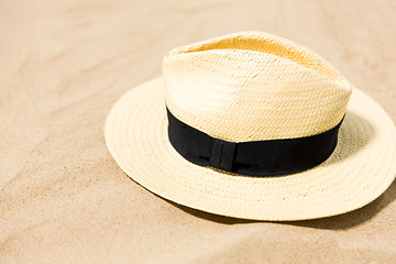 Image showing straw hat on beach sand