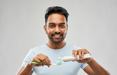 Image showing indian man with toothbrush and toothpaste