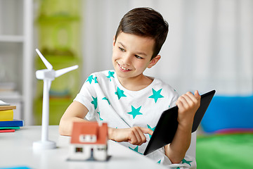 Image showing boy with tablet, toy house and wind turbine