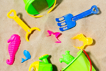 Image showing close up of sand toys kit on summer beach